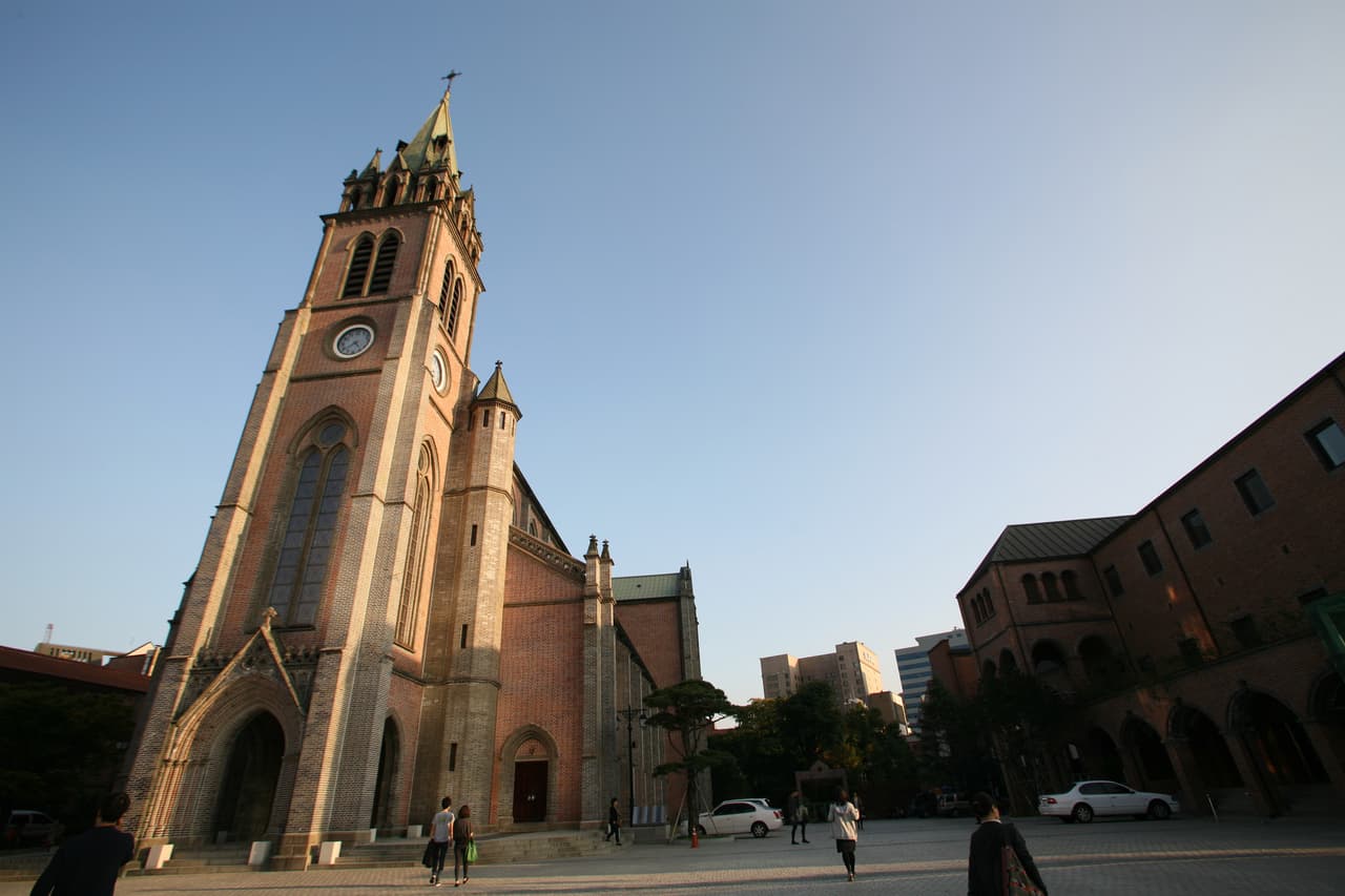 Myeongdong Cathedral against a clear evening sky in Seoul