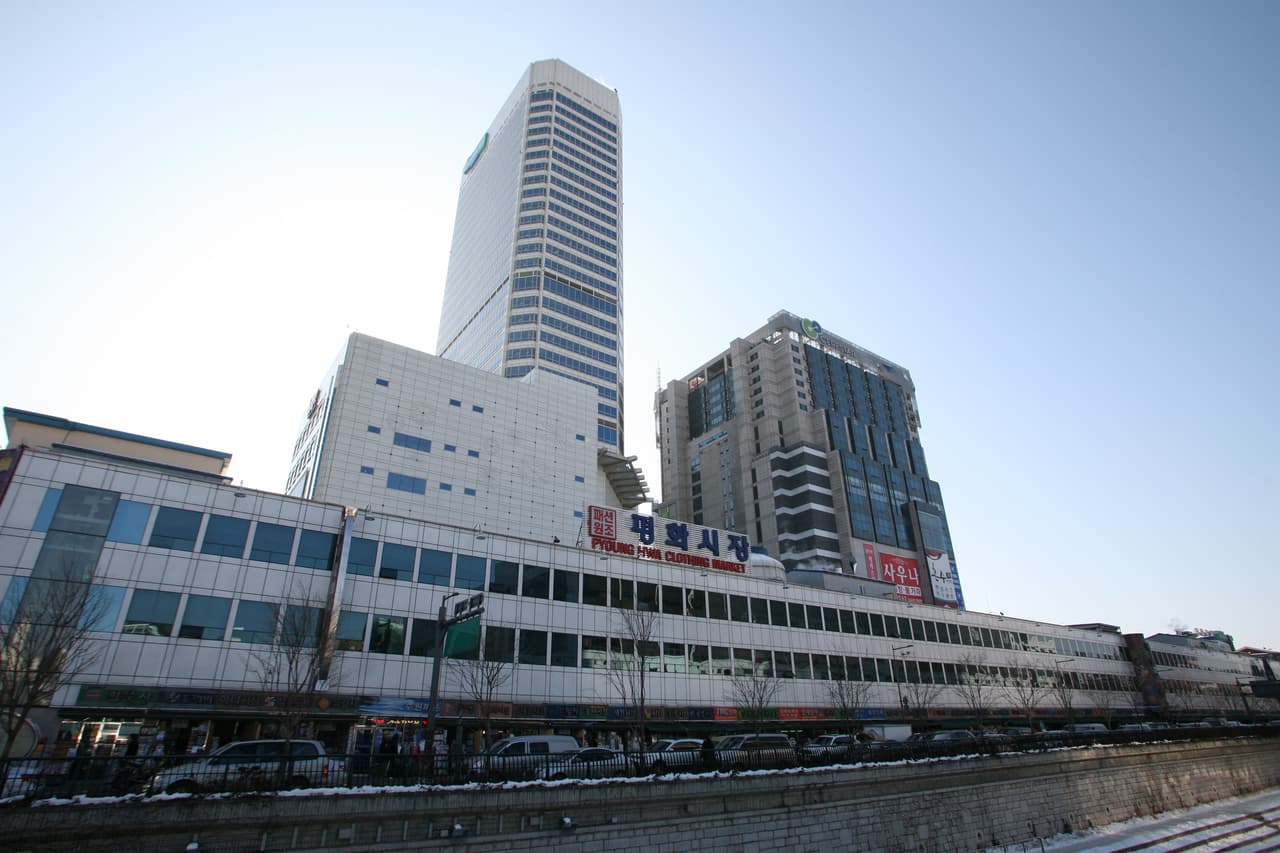 One of Dongdaemun's fashion market buildings among the district's high-rises in Seoul