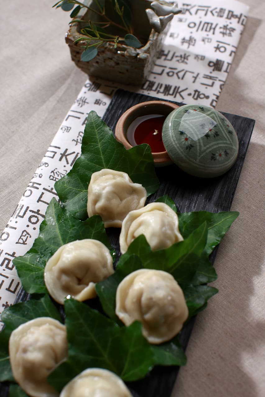 Korean mandu (dumplings) arranged on a plate