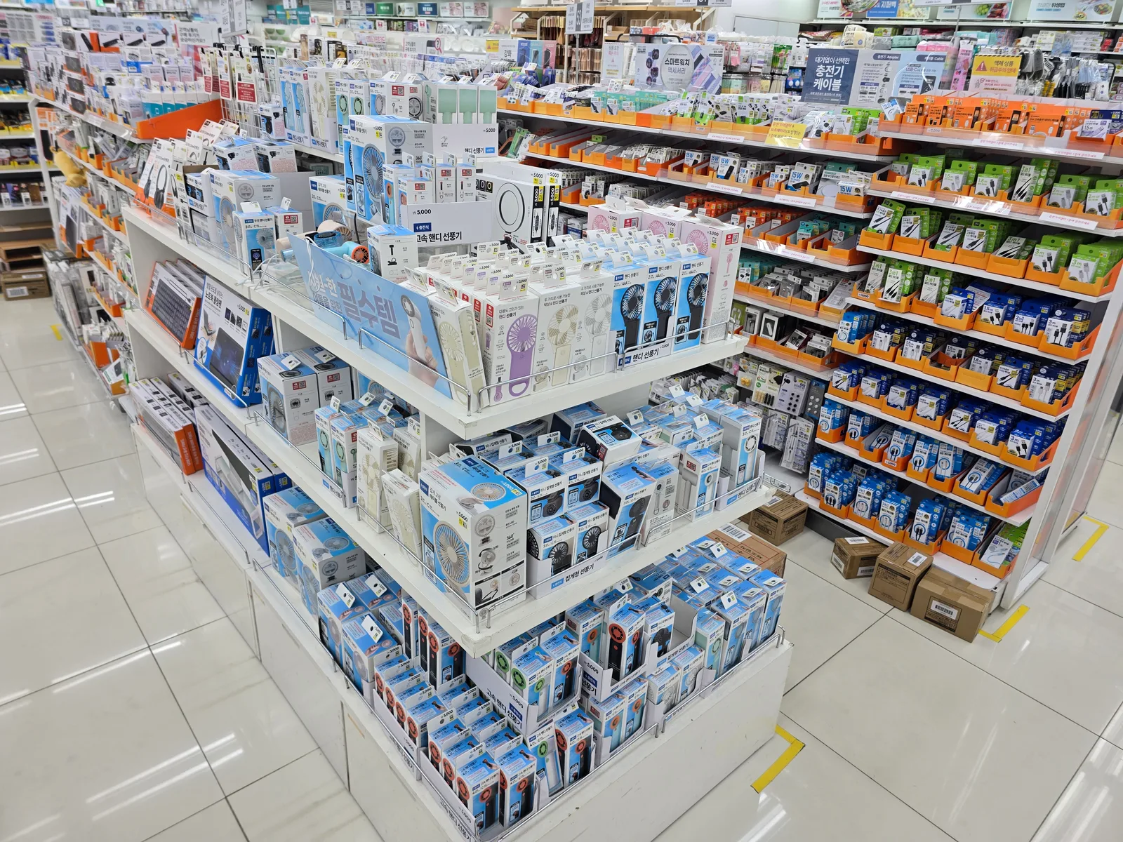 Budget Korean skincare and cosmetics lined on a Daiso store shelf