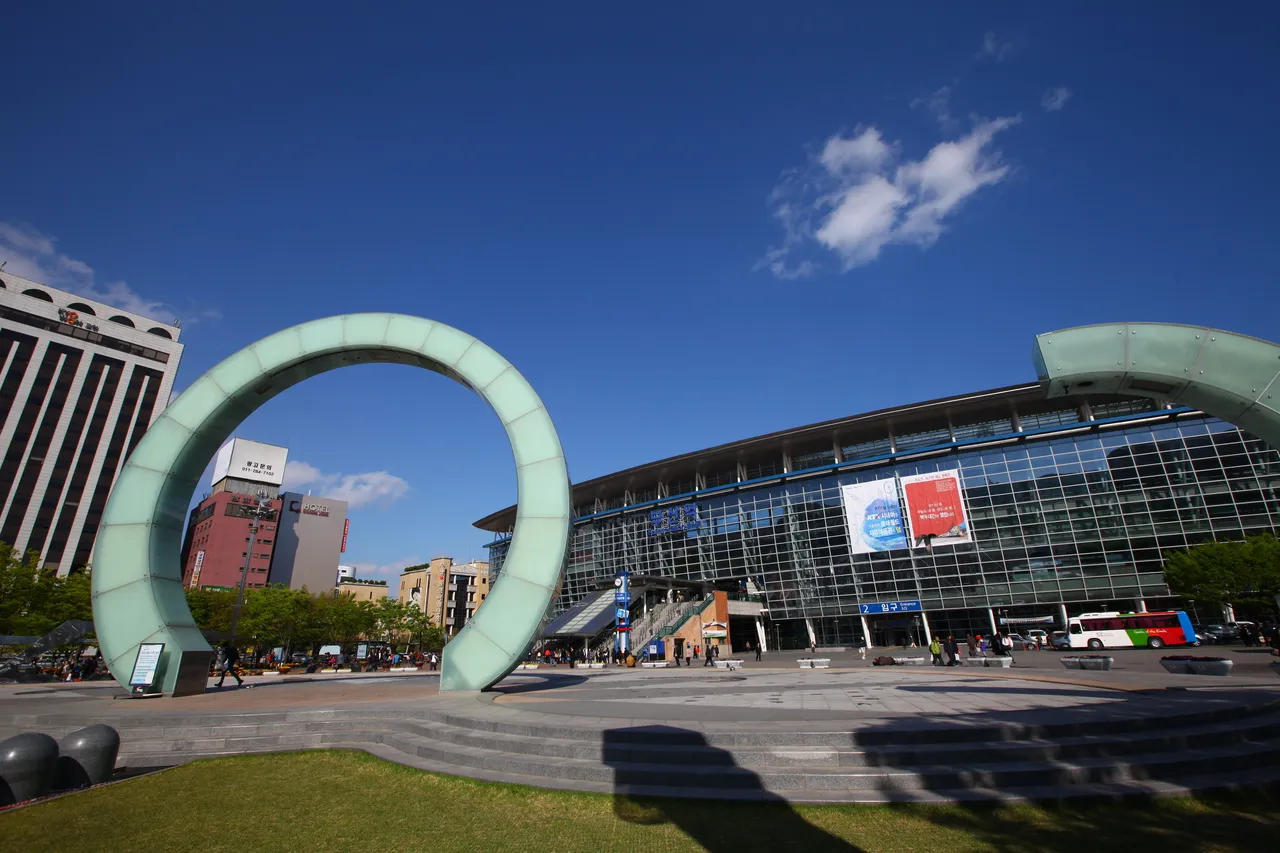 The exterior and plaza of Busan Station, a major Korean intercity rail terminus