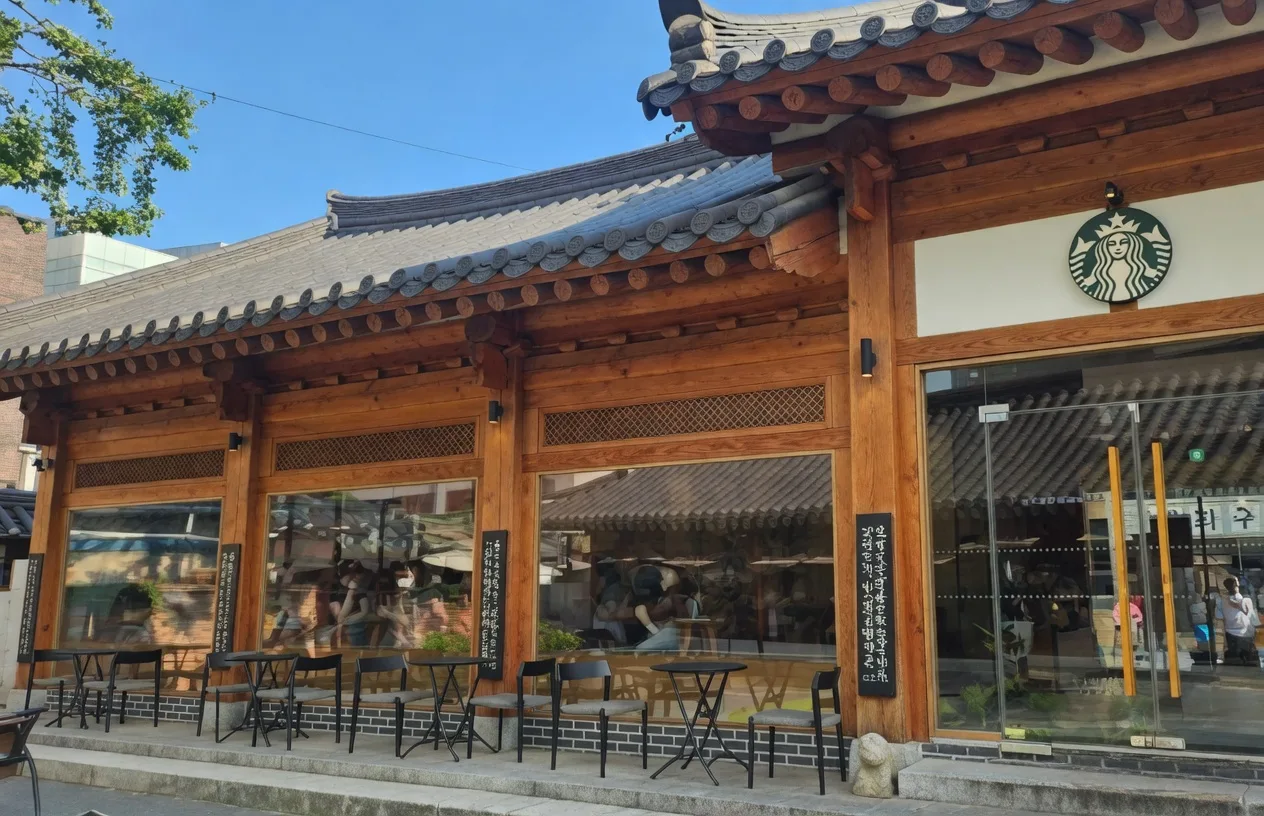 Street view of the restored Gyeongdong Theater building housing Starbucks Gyeongdong 1960